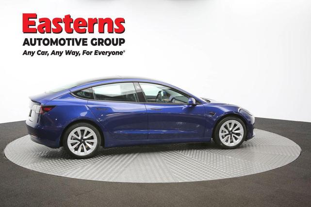 Photo of 2022 Deep Blue Metallic Tesla Model 3