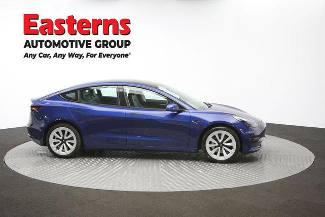 Photo of 2022 Deep Blue Metallic Tesla Model 3