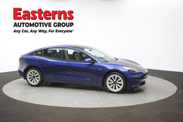 Photo of 2022 Deep Blue Metallic Tesla Model 3