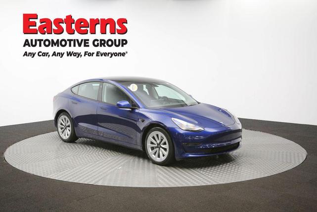 Photo of 2022 Deep Blue Metallic Tesla Model 3