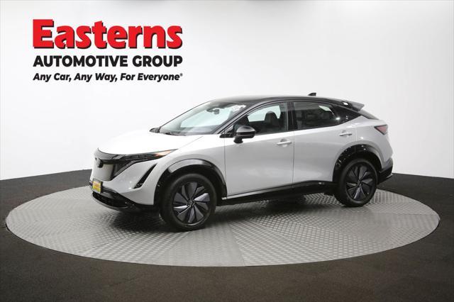 Photo of 2023 Brilliant Silver Metallic/Black Diamond Pearl Nissan ARIYA