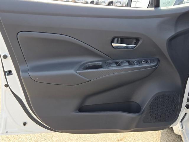 Photo of 2025 Aspen White Tricoat Nissan Versa