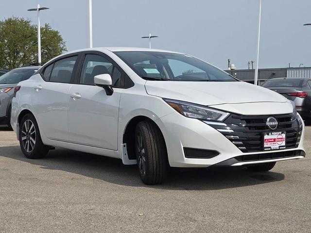 Photo of 2025 Aspen White Tricoat Nissan Versa