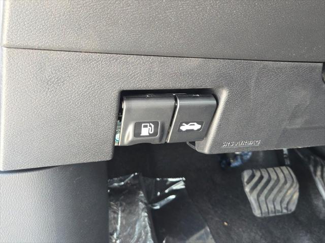 Photo of 2025 Aspen White Tricoat Nissan Versa