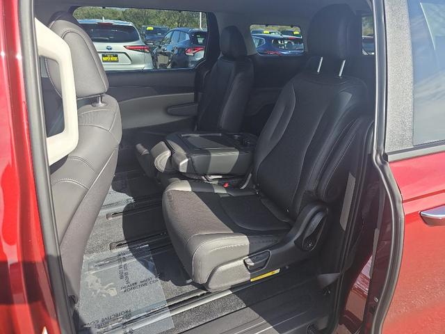 Photo of 2026 Flare Red Kia Carnival Hybrid