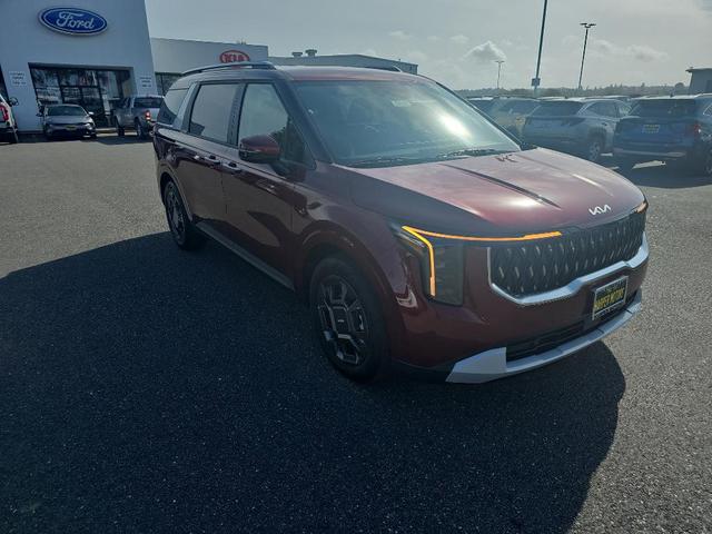 Photo of 2026 Flare Red Kia Carnival Hybrid
