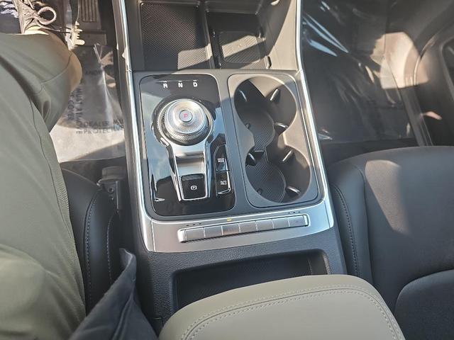 Photo of 2026 Flare Red Kia Carnival Hybrid