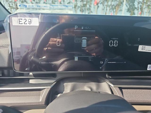 Photo of 2026 Flare Red Kia Carnival Hybrid