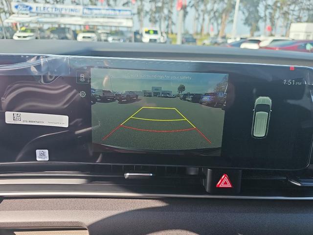 Photo of 2026 Flare Red Kia Carnival Hybrid