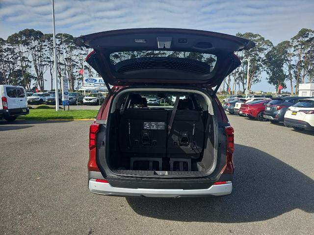 Photo of 2026 Flare Red Kia Carnival Hybrid