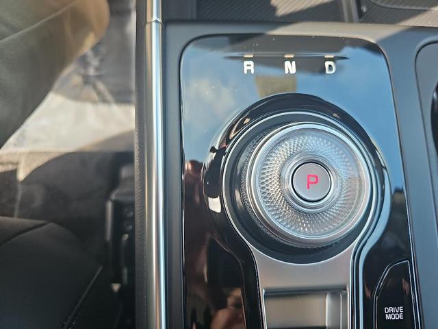 Photo of 2026 Flare Red Kia Carnival Hybrid