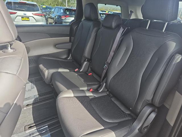 Photo of 2026 Flare Red Kia Carnival Hybrid