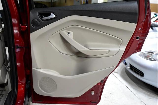 Photo of 2016 Ruby Red Metallic Tinted Clearcoat Ford Escape