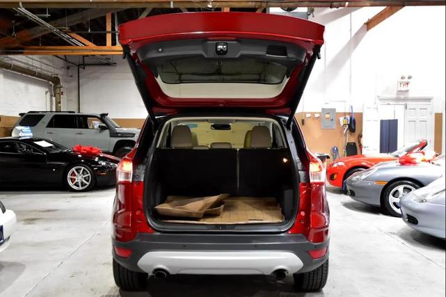 Photo of 2016 Ruby Red Metallic Tinted Clearcoat Ford Escape
