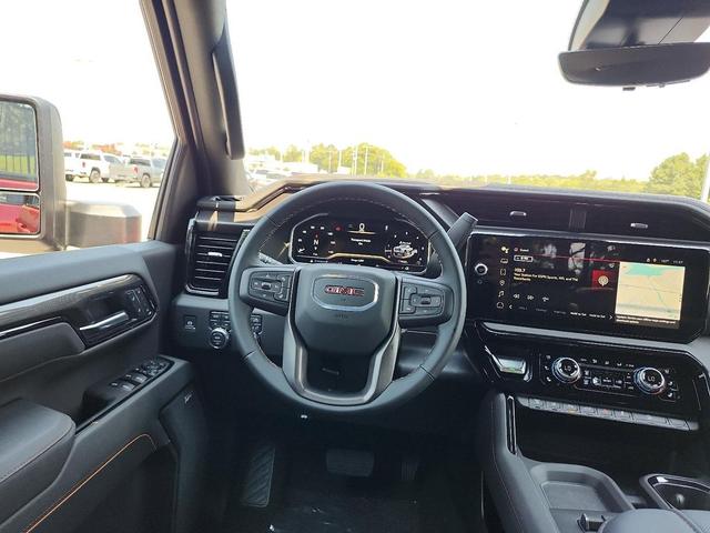 Photo of 2025 Volcanic Red Tintcoat GMC Sierra 2500