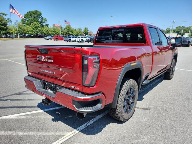 Photo of 2025 Volcanic Red Tintcoat GMC Sierra 2500