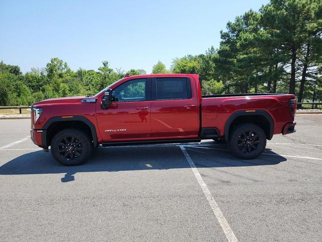 Photo of 2025 Volcanic Red Tintcoat GMC Sierra 2500
