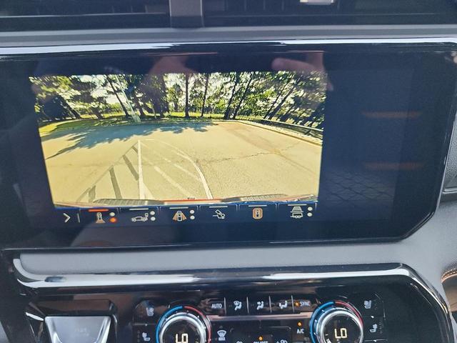 Photo of 2025 Volcanic Red Tintcoat GMC Sierra 2500