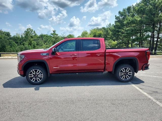 Photo of 2026 Volcanic Red Tintcoat GMC Sierra 1500