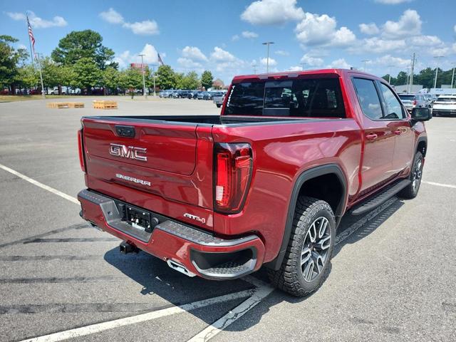 Photo of 2026 Volcanic Red Tintcoat GMC Sierra 1500