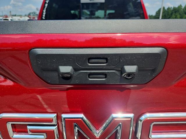 Photo of 2026 Volcanic Red Tintcoat GMC Sierra 1500