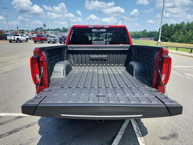 Photo of 2026 Volcanic Red Tintcoat GMC Sierra 1500