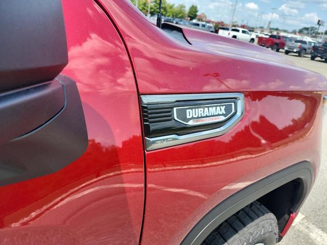 Photo of 2026 Volcanic Red Tintcoat GMC Sierra 1500