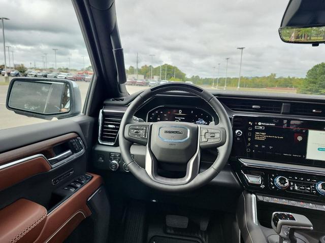 Photo of 2026 Glacier White Tricoat GMC Sierra 1500