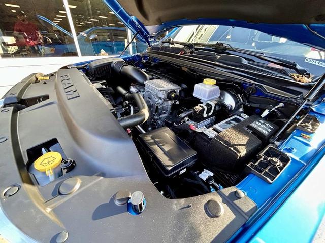 Photo of 2024 Hydro Blue Pearlcoat RAM 1500