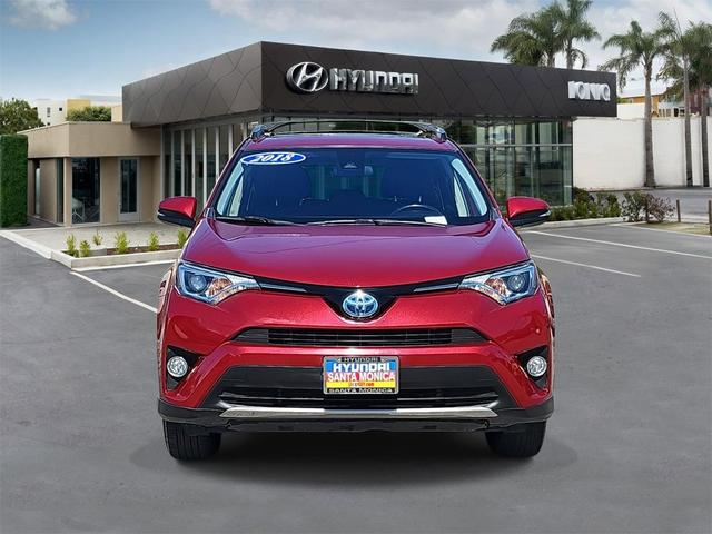 Photo of 2018 Ruby Flare Pearl Toyota RAV4 Hybrid
