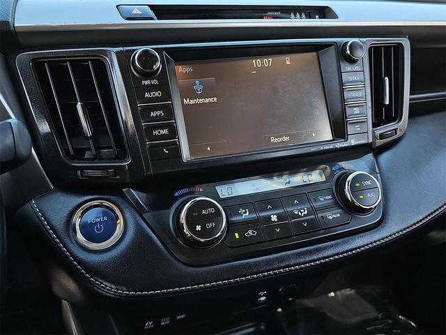 Photo of 2018 Ruby Flare Pearl Toyota RAV4 Hybrid