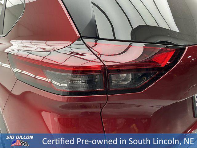 Photo of 2023 Scarlet Ember Tintcoat Nissan Rogue
