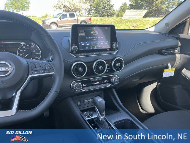 Photo of 2025 Aspen White Tricoat Nissan Sentra