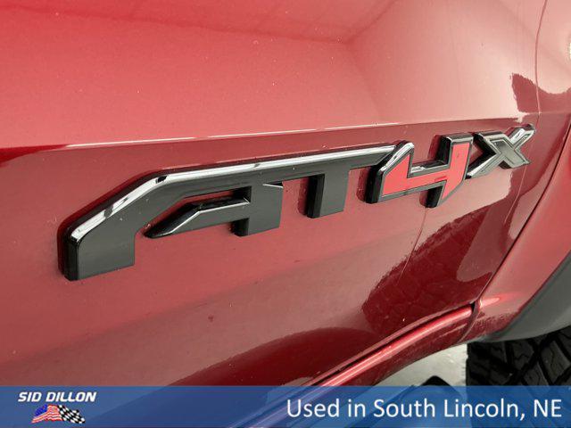 Photo of 2024 Volcanic Red Tintcoat GMC Canyon