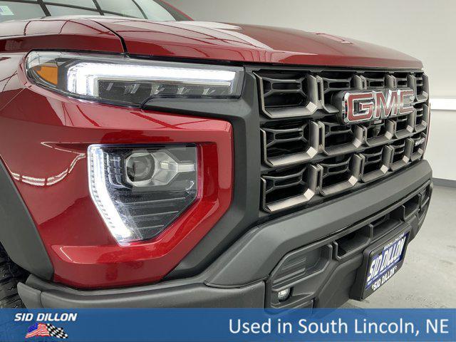 Photo of 2024 Volcanic Red Tintcoat GMC Canyon