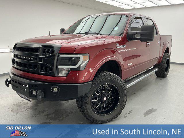 Photo of 2013 Ruby Red Metallic Tinted Clearcoat Ford F-150