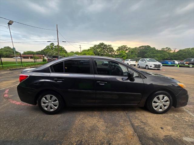 Photo of 2013 Dark Gray Metallic Subaru Impreza