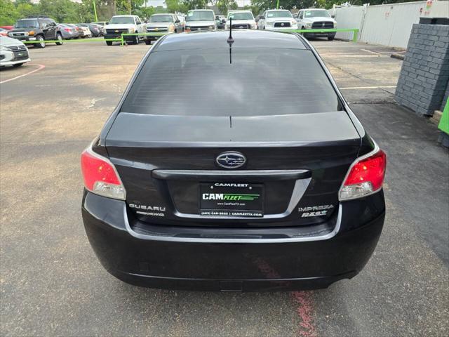 Photo of 2013 Dark Gray Metallic Subaru Impreza