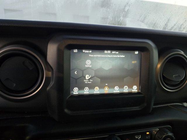 Photo of 2021 Snazzberry Pearlcoat Jeep Wrangler Unlimited