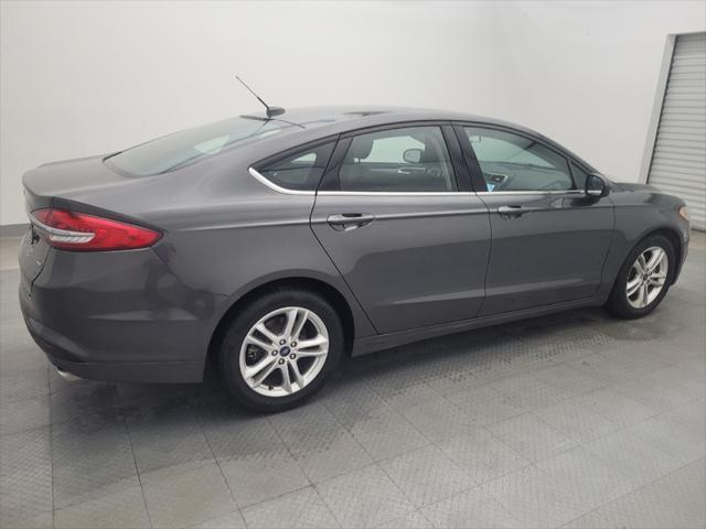 Photo of 2018 Magnetic Metallic Ford Fusion