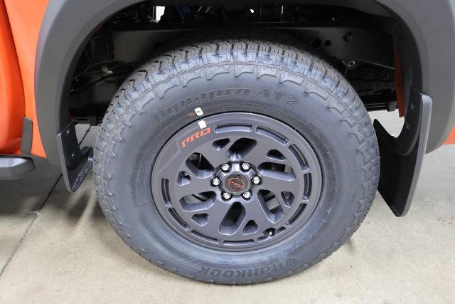 Photo of 2025 Afterburn Orang Nissan Frontier