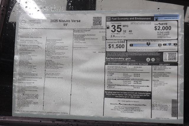 Photo of 2025 Aspen White Nissan Versa