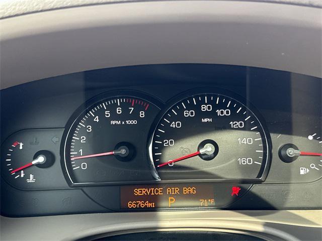 Photo of 2006 White Diamond Cadillac STS