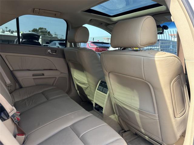 Photo of 2006 White Diamond Cadillac STS