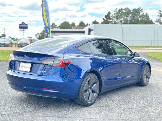 Photo of 2021 Deep Blue Metallic Tesla Model 3