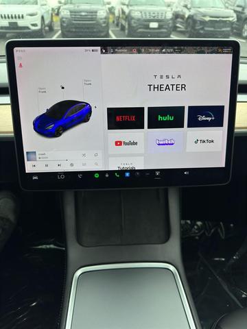 Photo of 2021 Deep Blue Metallic Tesla Model 3