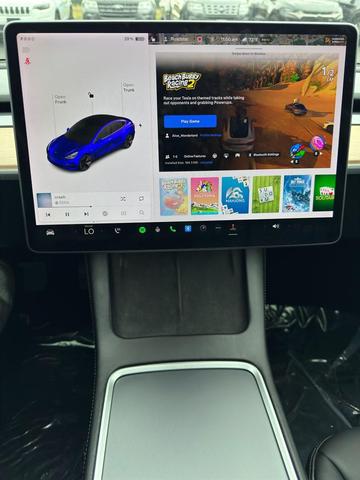 Photo of 2021 Deep Blue Metallic Tesla Model 3