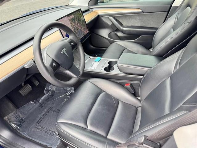 Photo of 2021 Deep Blue Metallic Tesla Model 3
