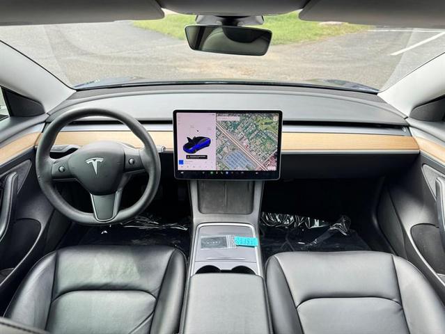 Photo of 2021 Deep Blue Metallic Tesla Model 3