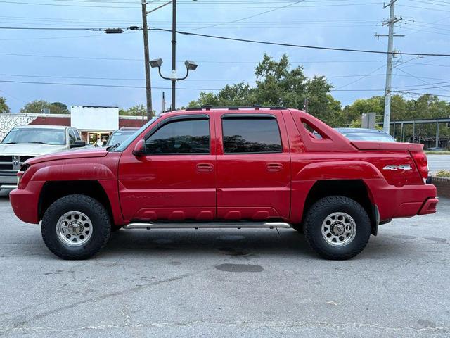 Photo of 2003 Victory Red Chevrolet Avalanche